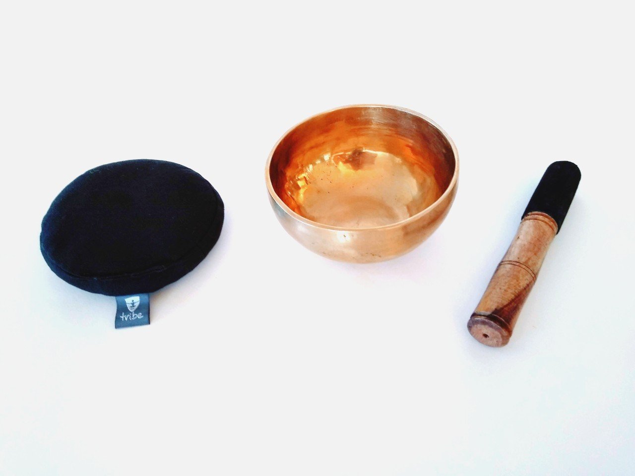 Tibetan Singing Bowl - brass bowl, wooden striker & cotton pad, side by side | TRIBE Yoga