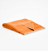 Get a Grip Towel - Mandarin - folded with corner turned over | TRIBE Yoga
