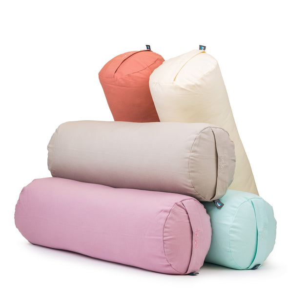 Round Bolsters - Organic Cotton Cover - group shot of pastel shades | TRIBE Yoga