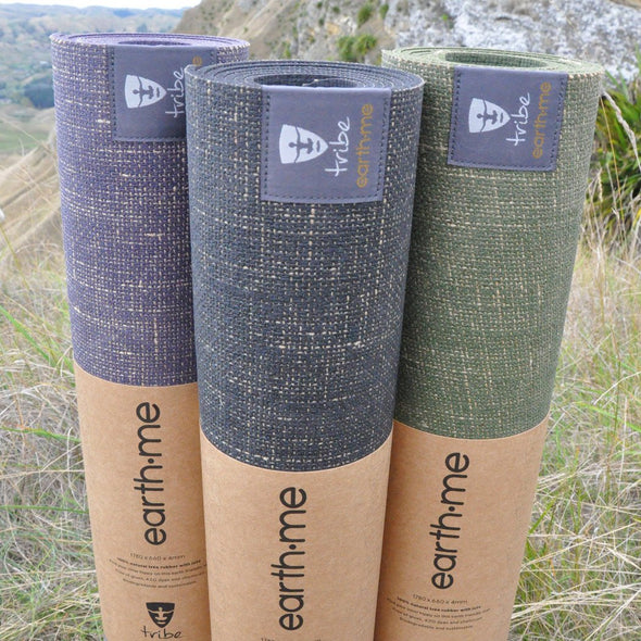 Earth.Me 4mm Yoga Mats, Amethyst, Cosmos, & Olive Colours, rolled, standing vertically side by side | TRIBE Yoga