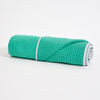 Get a Grip Towel - Emerald - rolled | TRIBE Yoga
